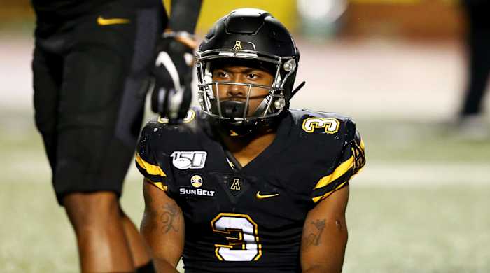Oct 31, 2019; Boone, NC, USA; Appalachian State Mountaineers running back Darrynton Evans (3) sits on the field after being tackled for a loss during the third quarter against the Georgia Southern Eagles at Kidd Brewer Stadium. Mandatory Credit: Jeremy Brevard-USA TODAY Sports